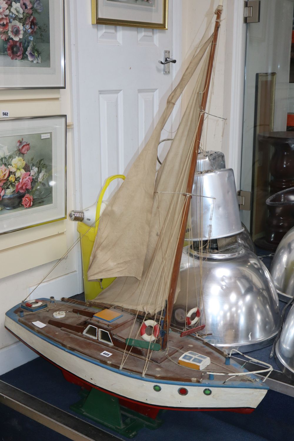 A painted pond yacht on stand, length 97cm